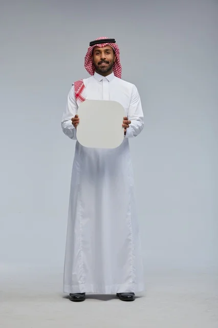Smiling Saudi Man Holding Blank White Board