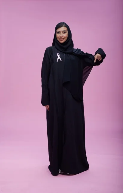 Saudi Woman with Breast Cancer Awareness Ribbon
