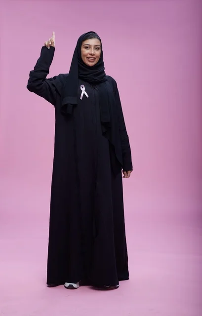 Saudi Woman with Breast Cancer Awareness Ribbon