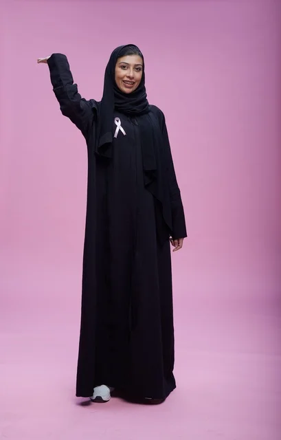 Saudi Woman with Breast Cancer Awareness Ribbon