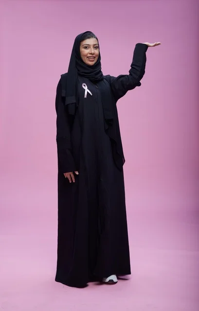 Saudi Woman with Breast Cancer Awareness Pink Ribbon