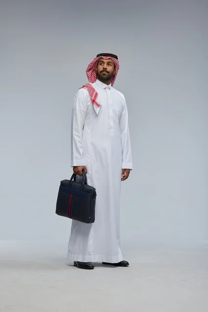 Saudi Businessman Carrying Briefcase in Studio