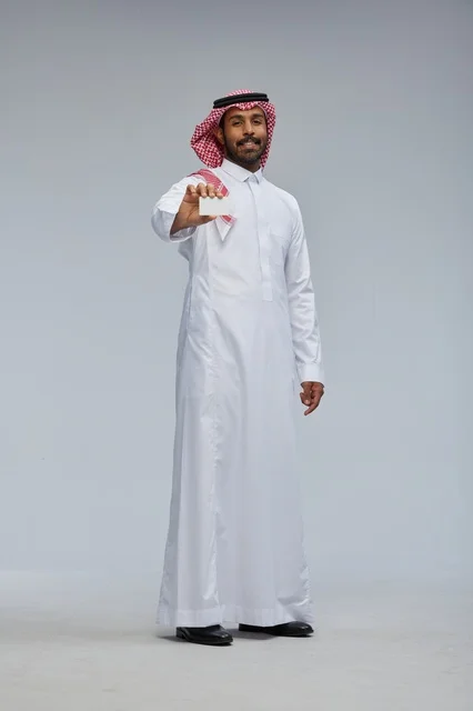 Saudi Man Holding Blank White Card in Studio