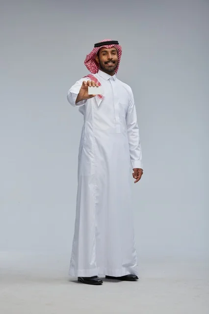 Saudi Man Holding Blank White Card in Studio