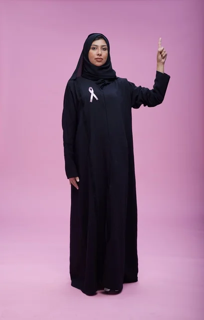 Saudi Woman with Breast Cancer Awareness Pink Ribbon