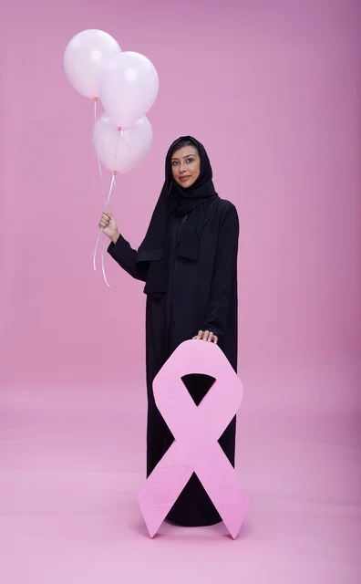 Saudi Woman with Breast Cancer Awareness Pink Ribbon