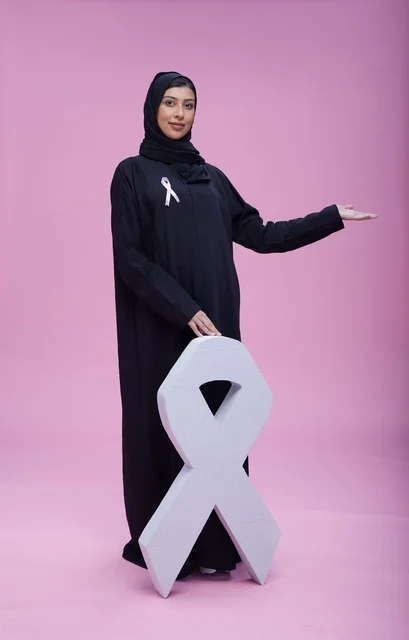 Saudi Woman with Breast Cancer Awareness Ribbon