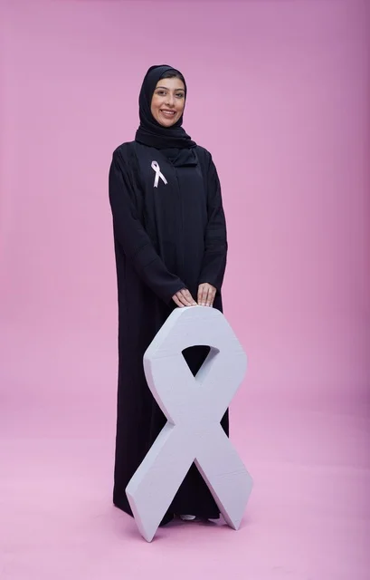 Saudi Woman with Breast Cancer Awareness Ribbon