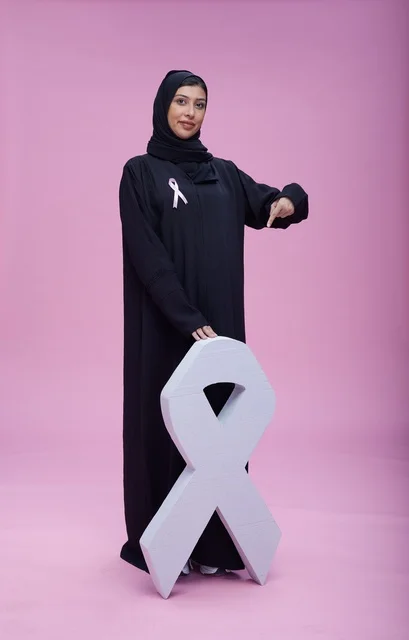 Saudi Woman with Breast Cancer Awareness Ribbon