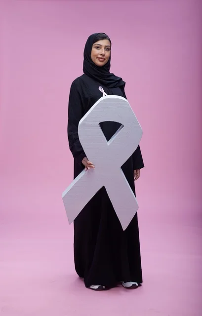 Saudi Woman with Breast Cancer Awareness Ribbon
