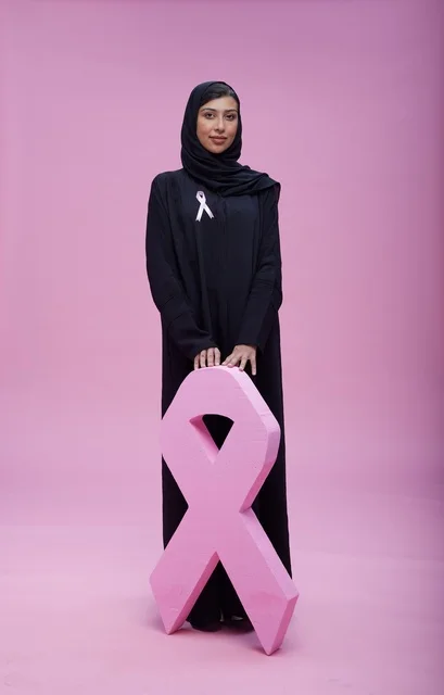 Saudi Woman with Breast Cancer Awareness Pink Ribbon