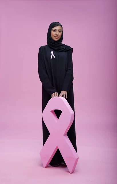 Saudi Woman with Breast Cancer Awareness Pink Ribbon