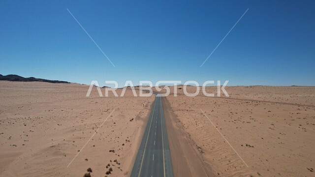 Picture of the highway in the middle of the desert, desert road, asphalt highway between sand dunes, desert roads, desert areas
