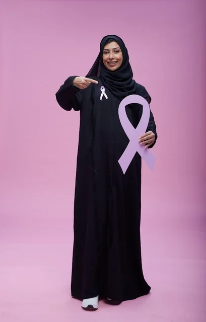 Saudi Woman Holding Breast Cancer Awareness Ribbon