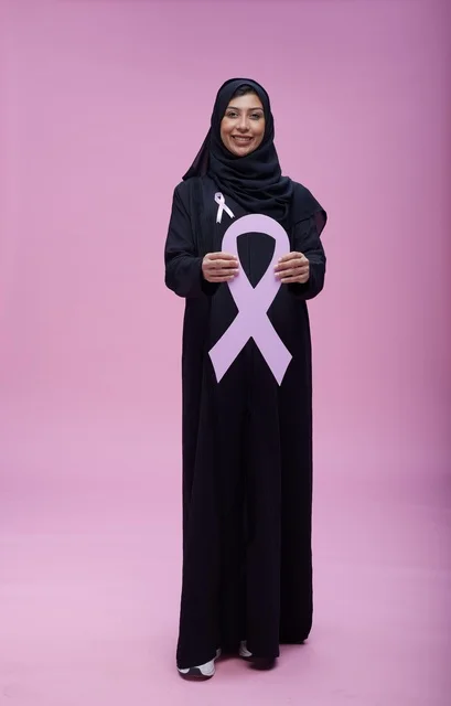 Saudi Woman Holding Breast Cancer Pink Ribbon