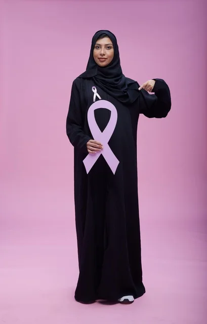 Saudi Woman Holding Breast Cancer Pink Ribbon Studio