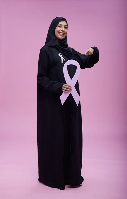 Saudi Woman with Breast Cancer Awareness Pink Ribbon