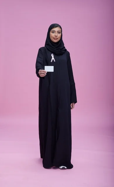 Saudi Woman Breast Cancer Awareness on Pink Background