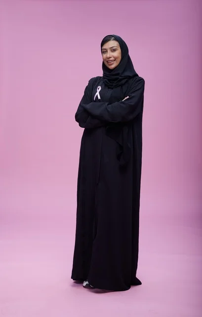 Saudi Woman Supporting Breast Cancer Awareness Pink Ribbon