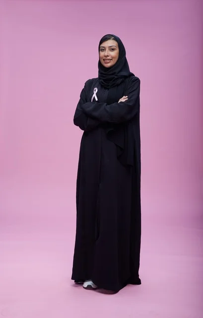 Saudi Woman Supporting Breast Cancer Awareness Pink Ribbon