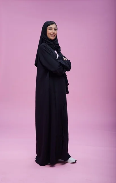 Saudi Woman Supporting Breast Cancer Awareness Pink Background