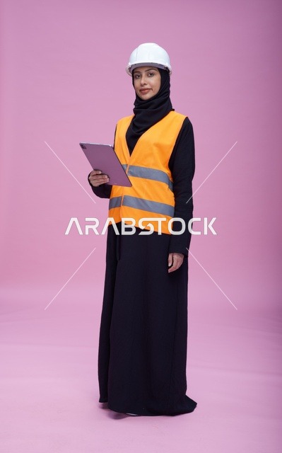 Saudi Female Engineer with Tablet in Safety Gear