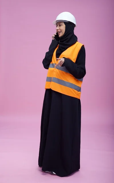 Saudi Female Engineer Talking on Phone in Studio