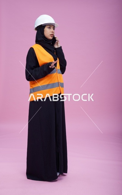 Saudi Female Engineer on Phone in Studio