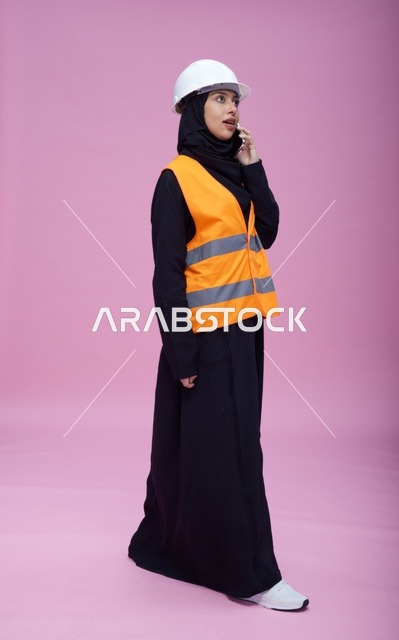 Saudi Female Engineer Talking on Phone in Studio