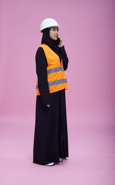 Saudi Female Engineer Talking on Phone in Studio