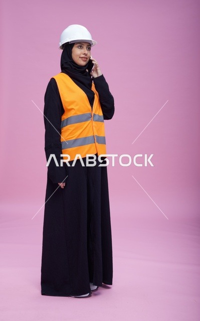 Saudi Female Engineer Talking on Phone in Studio