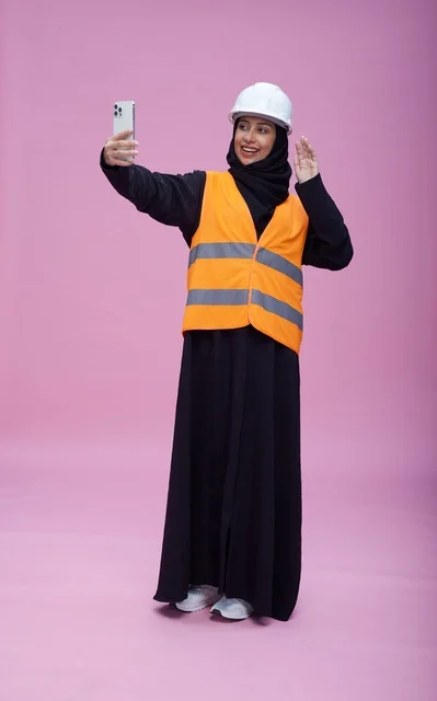 Saudi Female Engineer Smartphone Selfie on Pink