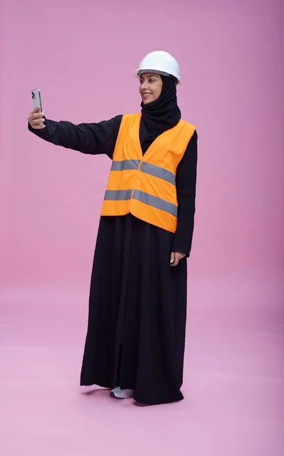 Saudi Female Engineer Taking Selfie in Safety Gear