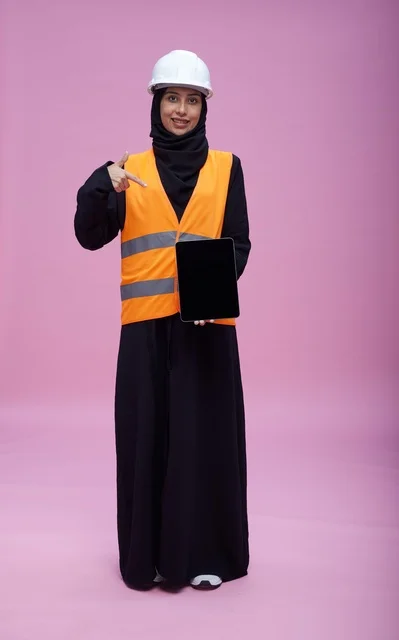 Saudi Female Engineer Holding Tablet in Studio