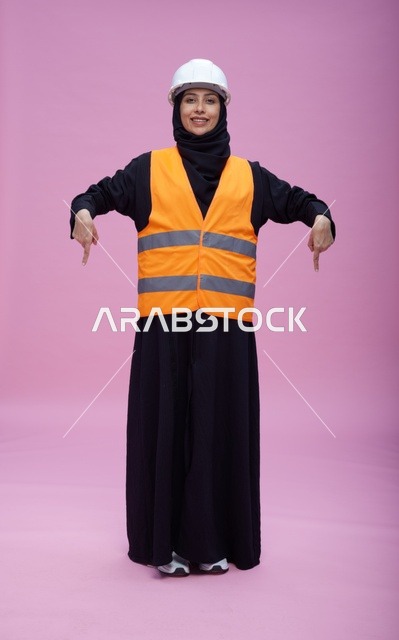 Saudi Female Engineer in Safety Gear on Pink Background