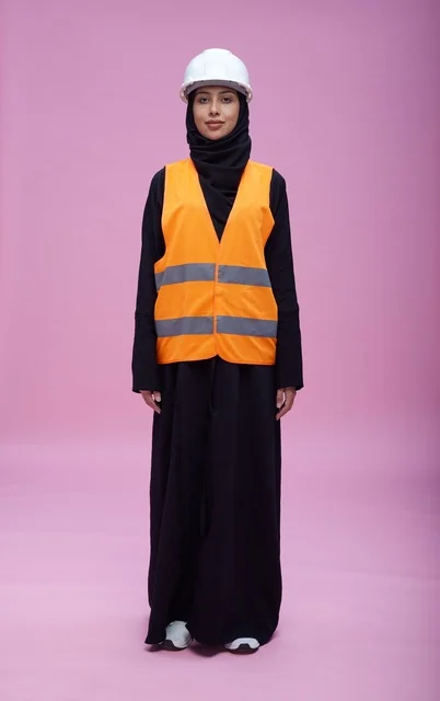 Saudi Female Engineer wearing Safety Vest and Hard Hat