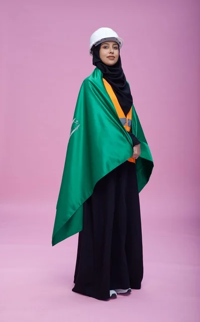 Saudi Female Engineer with National Flag in Studio