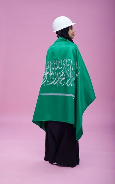 Saudi Female Engineer with National Flag in Studio