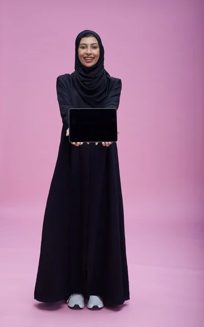 Saudi Woman Holding Tablet with Blank Screen