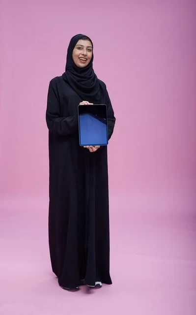 Saudi Woman Holding Tablet with Blank Screen