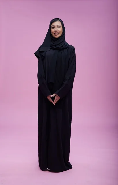 Saudi Woman in Black Abaya on Purple Background