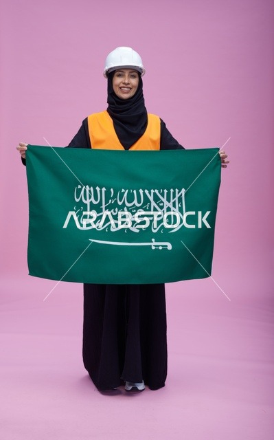 Saudi Female Engineer Holding Flag on Pink Background