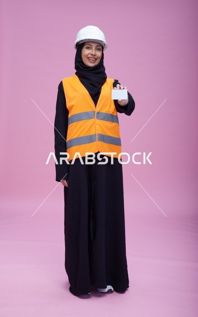 Saudi Female Engineer Holding Blank Card in Studio