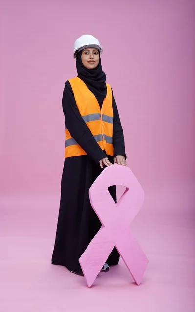 Saudi Female Engineer with Breast Cancer Awareness Ribbon