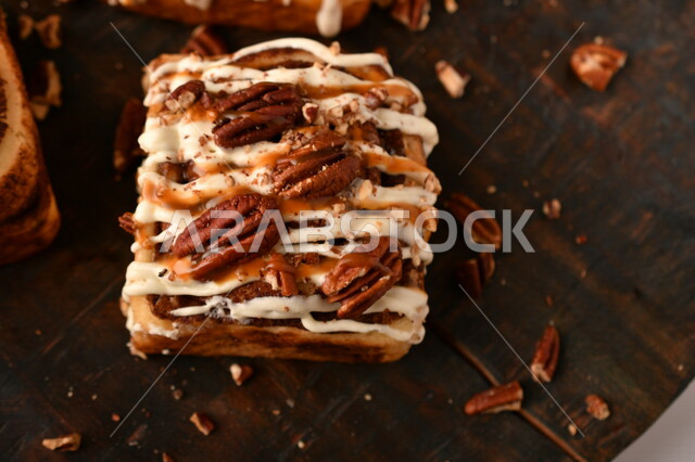 Close-up of delicious cinnamon rolls, cinnabon rolls, pastries, fresh baked goods, delicious dessert rolls