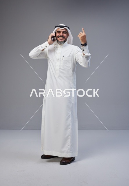 Saudi Man Talking on Phone with Hand Gesture