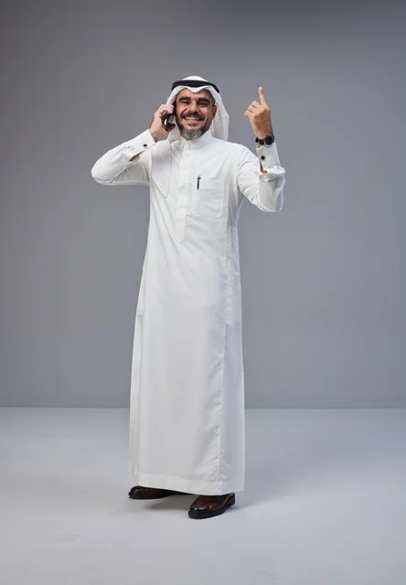 Saudi Man Talking on Phone with Hand Gesture