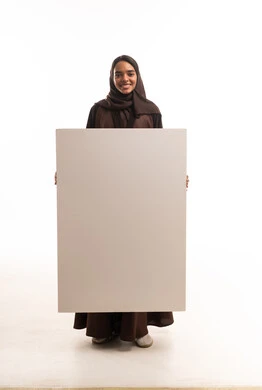 Saudi Woman in Abaya Holding Blank White Board