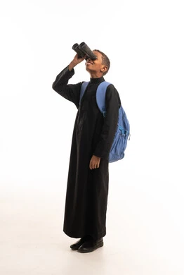 Saudi Boy in Black Thobe Looking Through Binoculars
