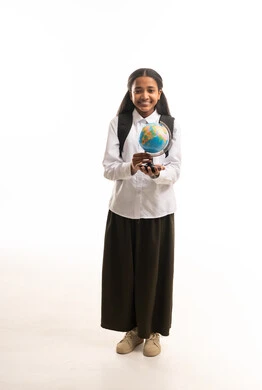 Saudi Schoolgirl Holding World Globe in Uniform